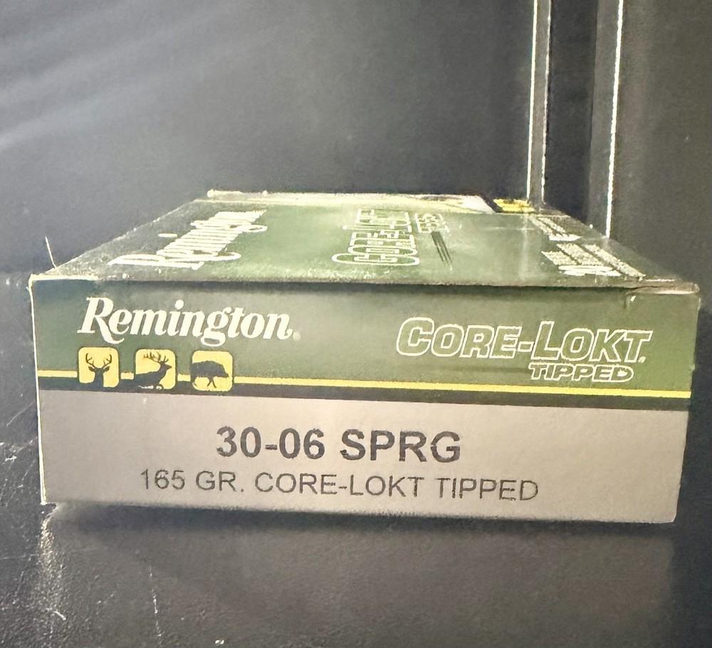 Various empty cardboard ammo boxes.