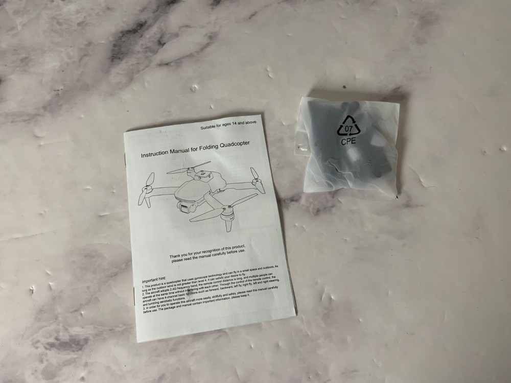 TizzyToy FPV Foldable Drone Quadcopter Silver-Brushless Camera App Control