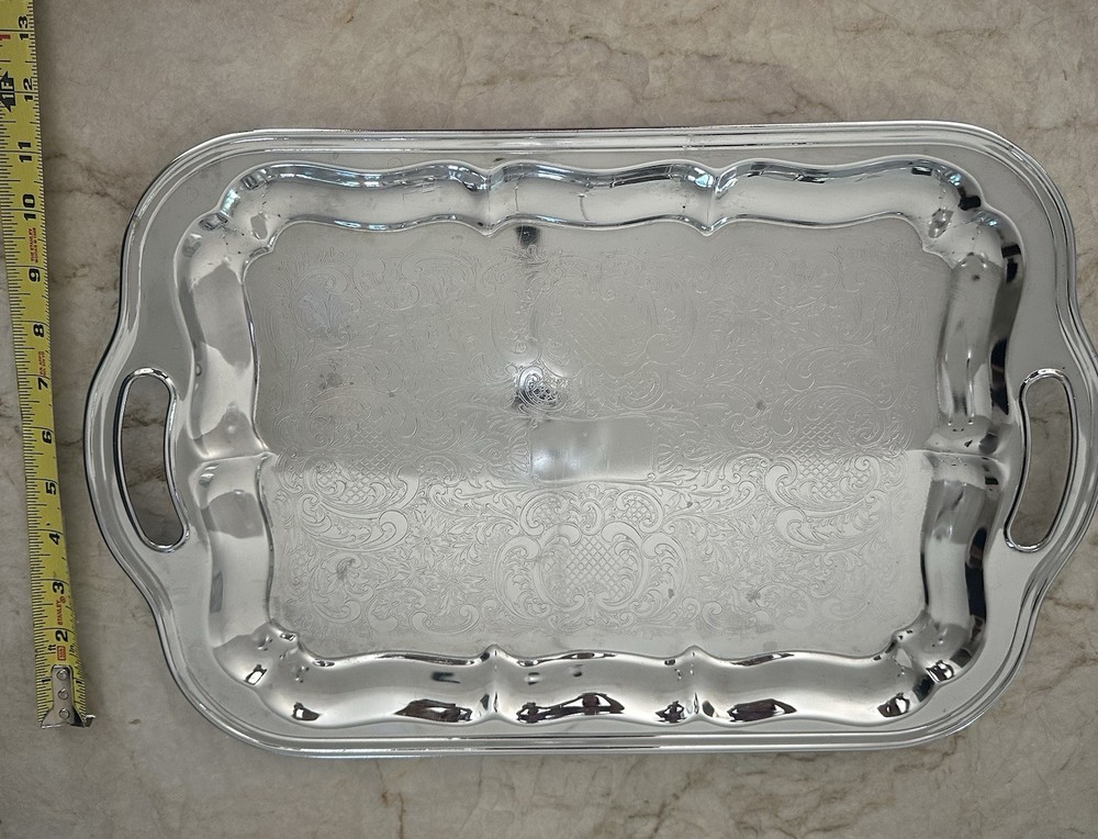 Two Chrome Plated Serving Platters, One Irvingware