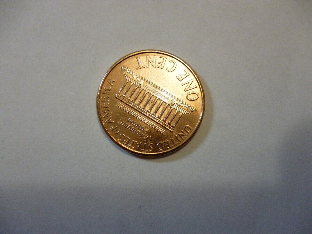 2000 penny, Floating roof coin
