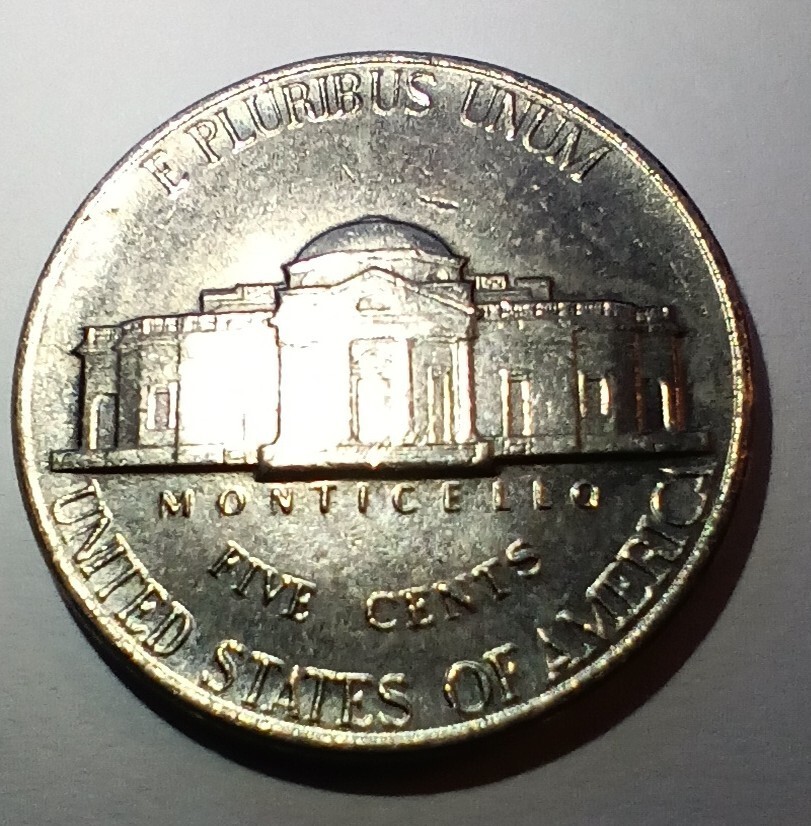 1990 D Jefferson US Error nickel f.s., strike over, feeder teeth, pristine