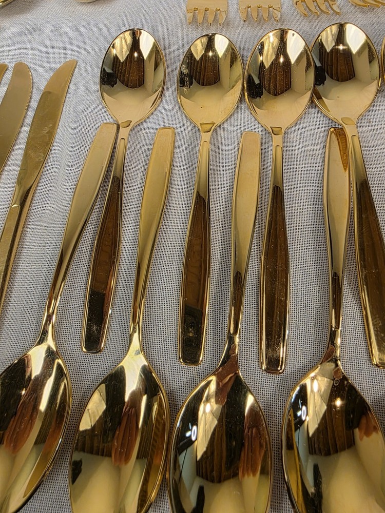 80 Pc Rogers Gold Stainless Flatware. USA.