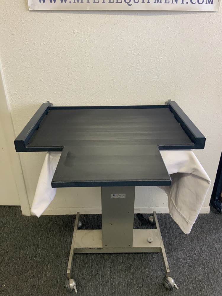 Ophthalmic Chair mover. TOPCON