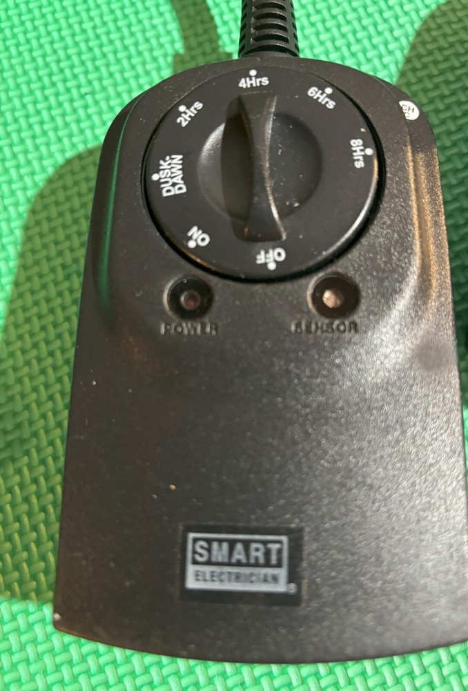 Smart Electrician 24 HR Timer with two outlets and Photocell sensor.