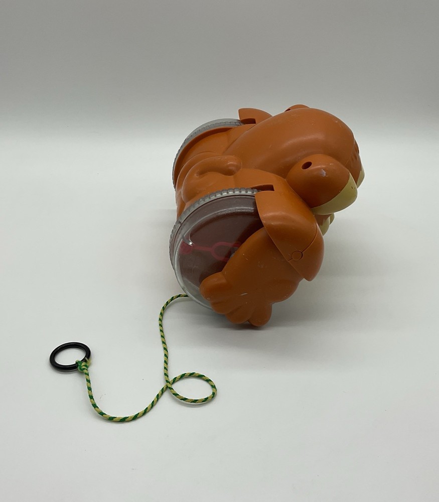 Vintage 1980s Pull Along Monkey Toy Rolling