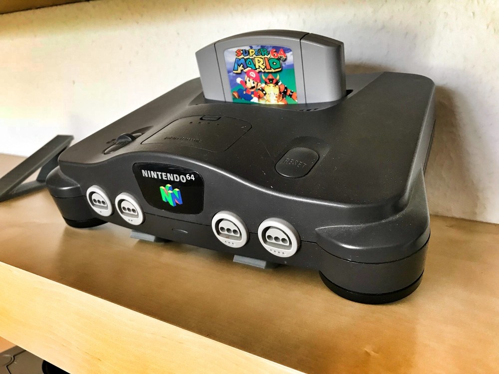 Universal game console stand display