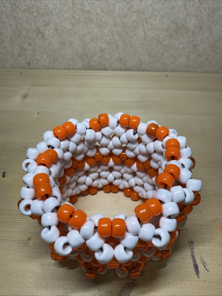 Orange And White Kandi Rotator Cuff
