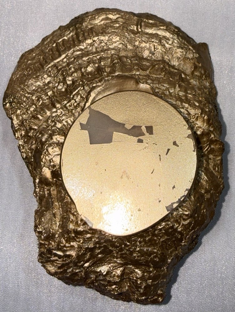 Decoupaged oyster shell ring dish featuring a Buddha image with gold-leaf edging