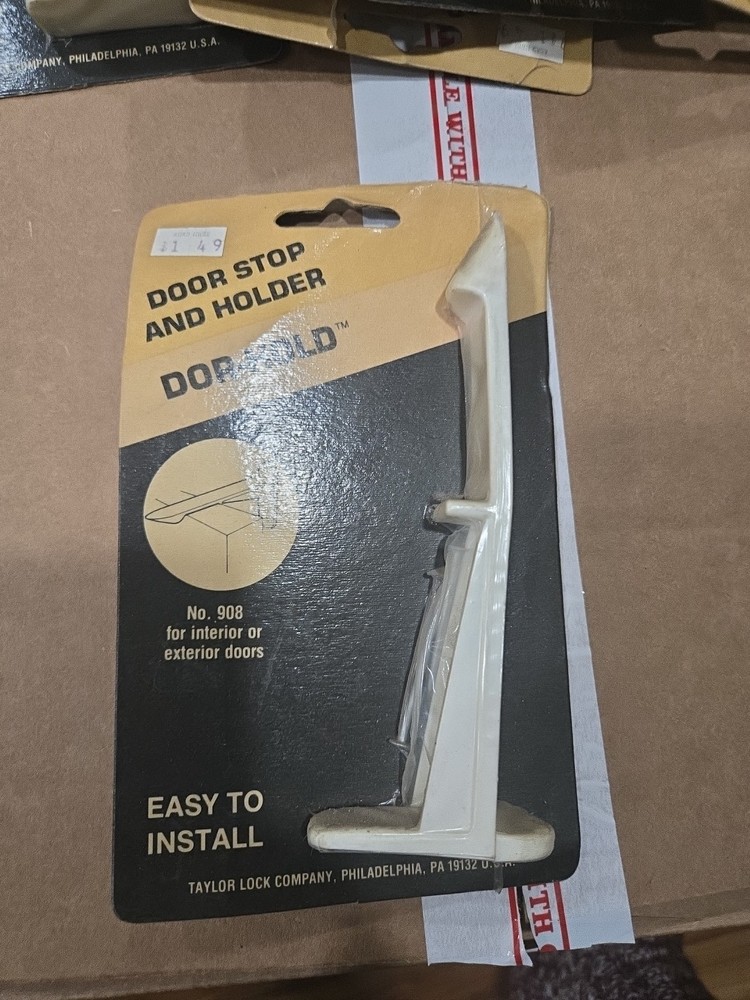 Dor-Hold Stop And Holder