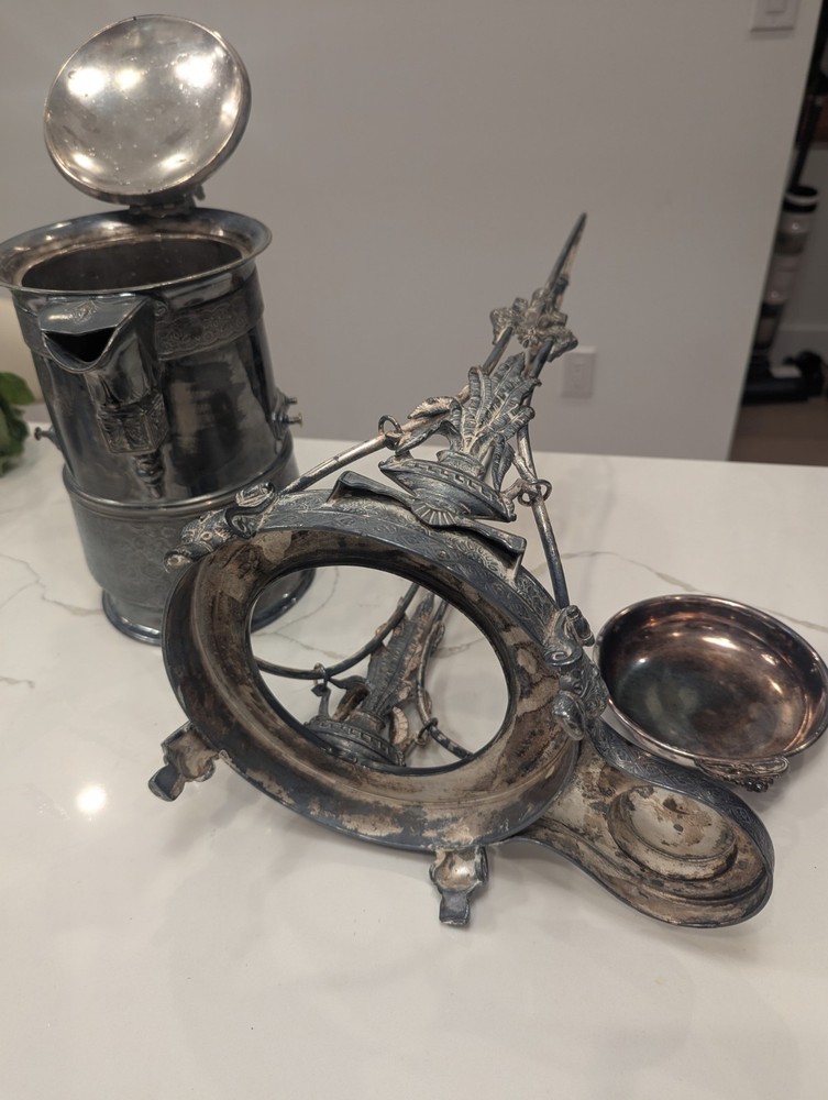 James W Tufts Silver Plated Tilting Water Pitcher