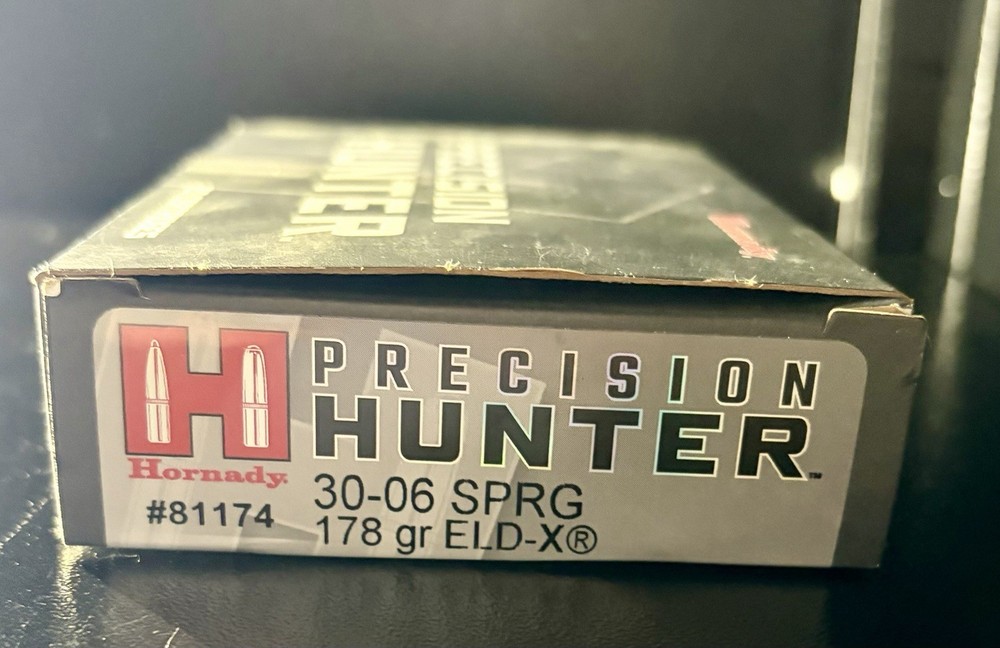 Various empty cardboard ammo boxes.