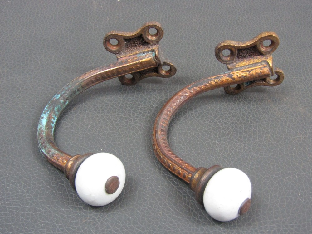 Pair vintage brass & porcelain coat hooks