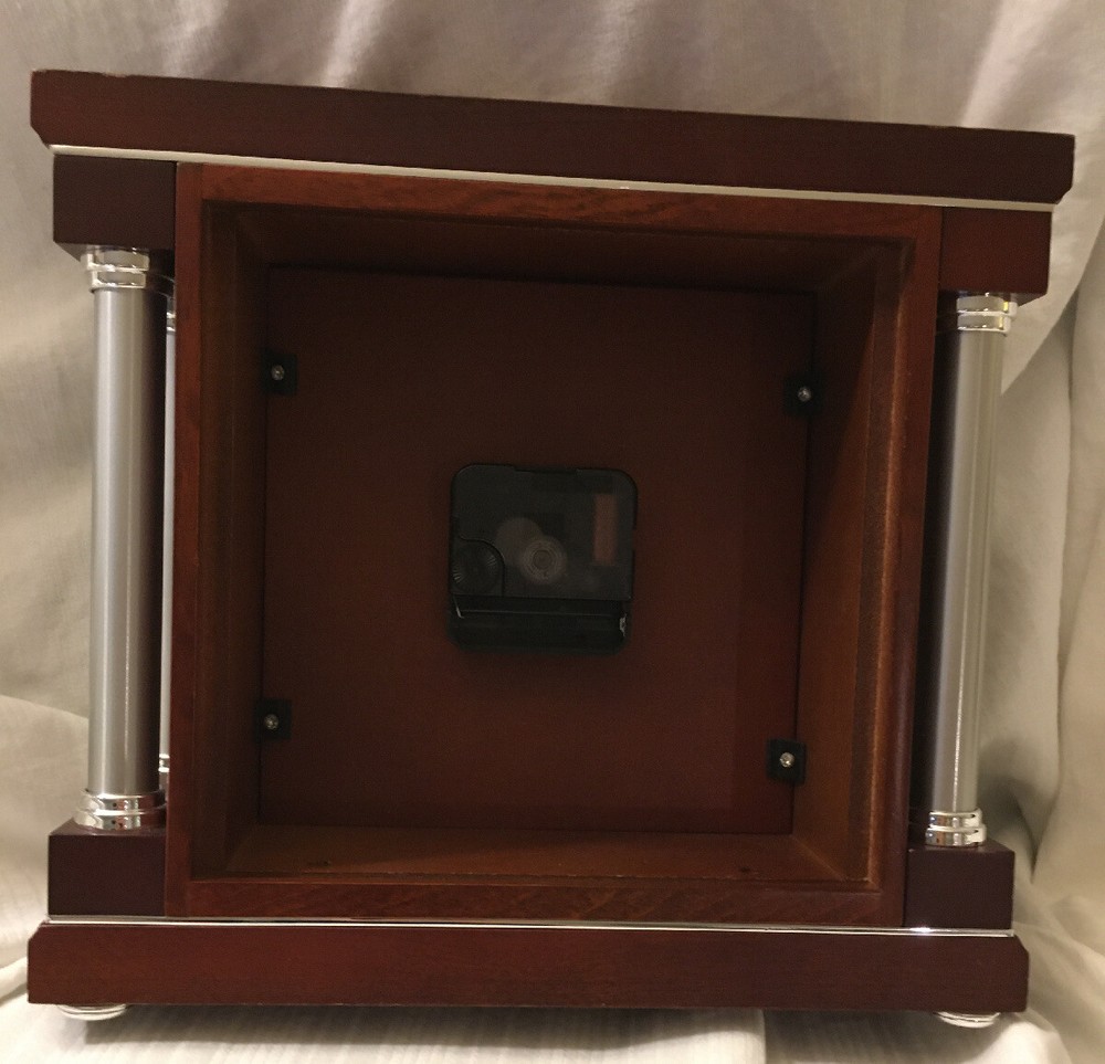 Bulova Solid Wood Case Silver Tone Metal Sides Clock B7651 Lightly used.