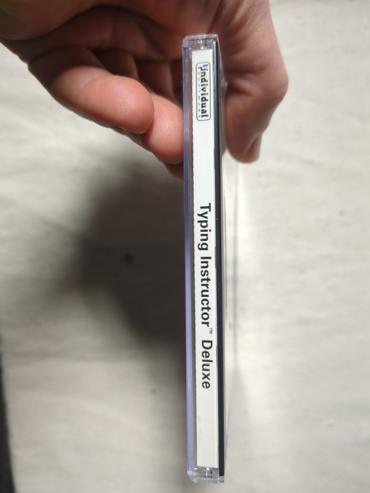 Typing Instructor Deluxe.( 2002 Individual Software).