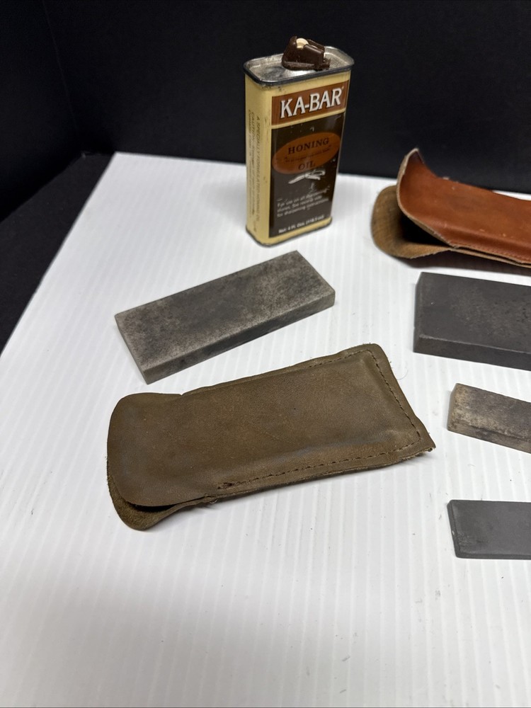 Six Sharpening Stones Some With Sheaths + Honing Oil (almost Empty)