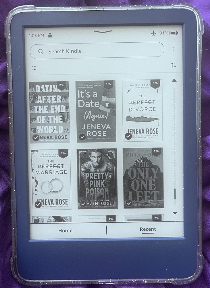 Amazon Kindle ereader Blue with books