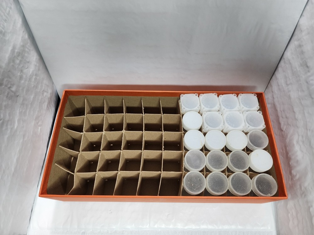 20 Quarter Square And Round Storage Tubes With Orange Storage Box