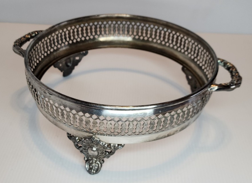 Round Silver-Plated Casserole Dish Holder. 8 1/4" + hdls on OD. 7-7/8" ID.3.25t