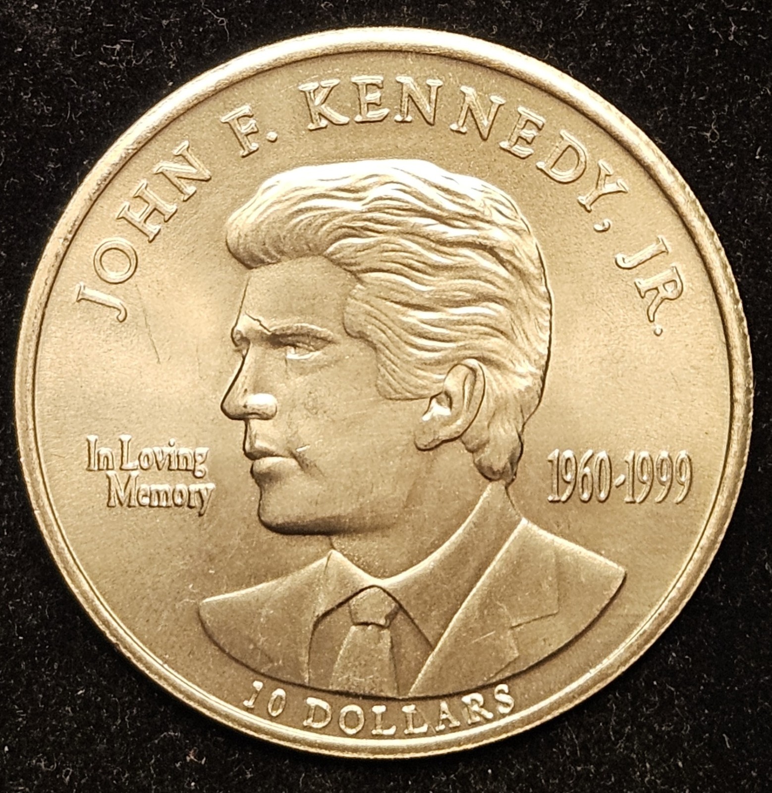 (1)  2000 Republic of Liberia 10 Dollar John F. Kennedy Jr. Coin, Nickel