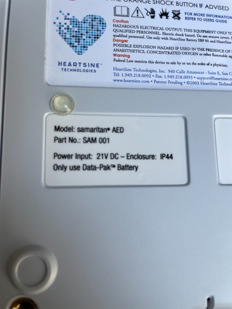 HEARTSINE Samaritan AED with accessories shown *battery dead* (H2-E)