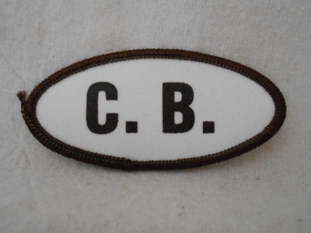 C.B.  USED SILK SCREEN NAME PATCH TAG BROWN ON WHITE