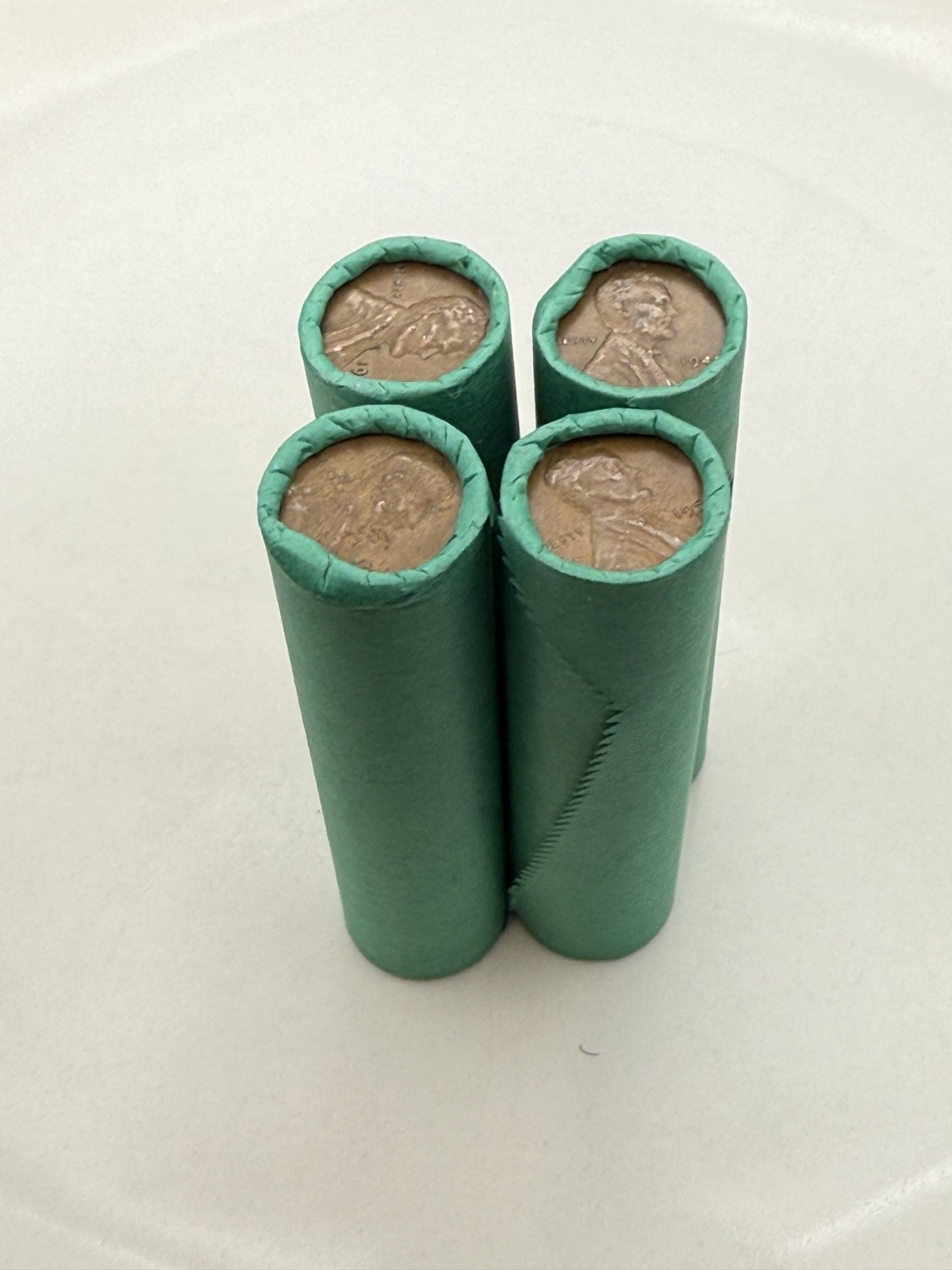 SILVER MERCURY DIME showing on old vintage unsearched green wheat penny roll us