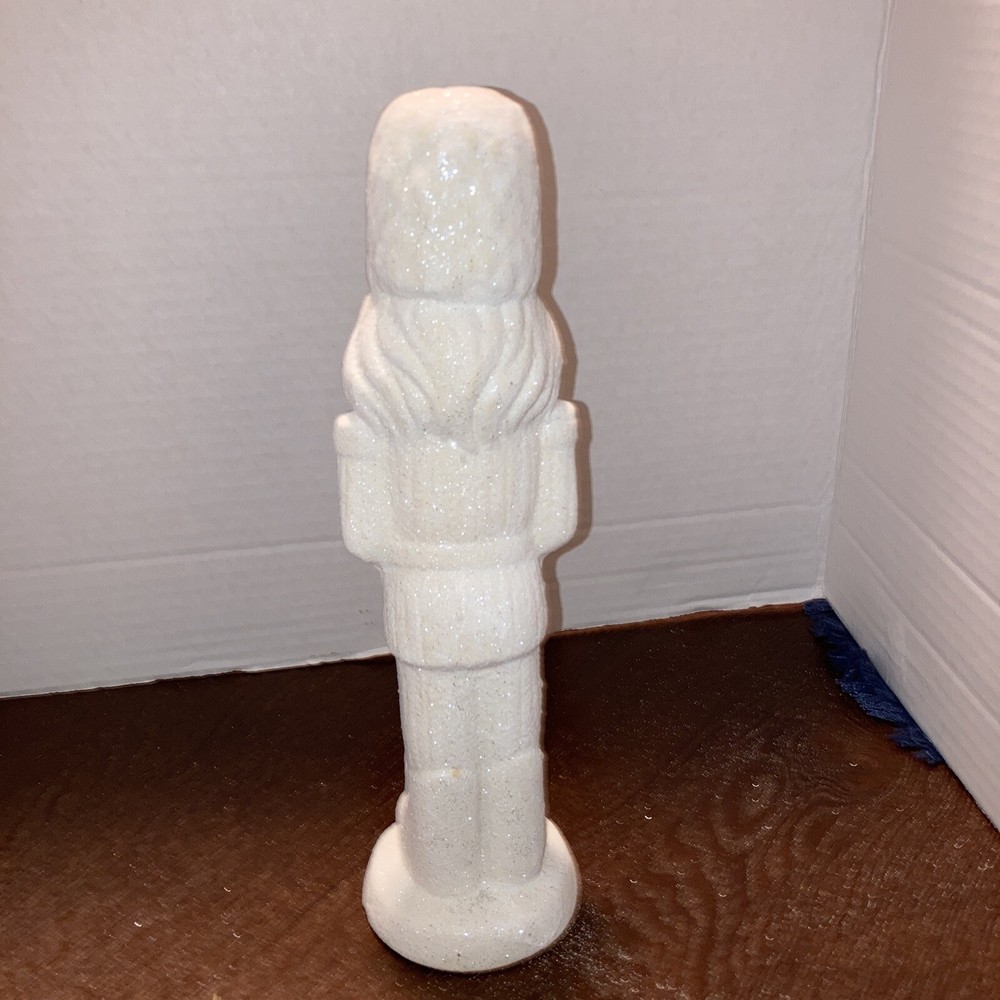 Christmas Ceramic Decor White glitter 10inx2 3/4in nutcracker soldier