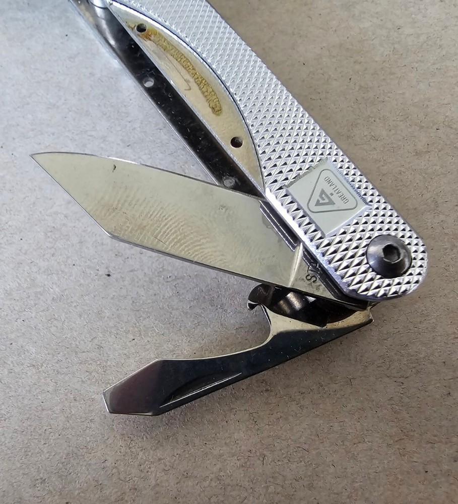 Pocket Multi-Tool with 9 Tools - Pliers Cutters Opener Flat Head Scissors Knife