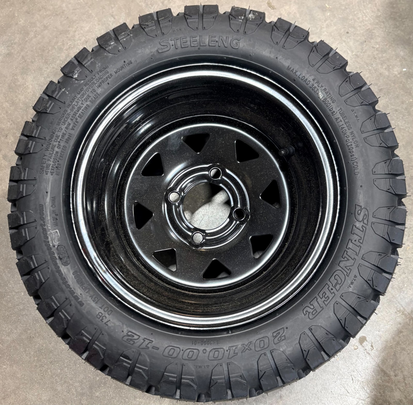 12" Black Steel Wheel & 20x10-12" Stinger All Terrain DOT Tire - Set of 4 (USED)