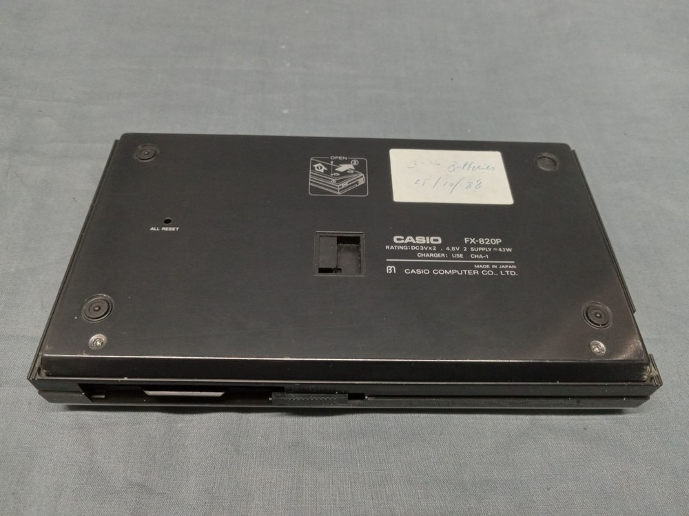 CASIO FX-820P Personal Computer With Charger Case and Manuals FULLY FUNCTIONAL!