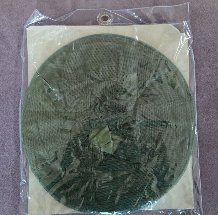 Mosquito/bug out hat with mesh face shield-open package