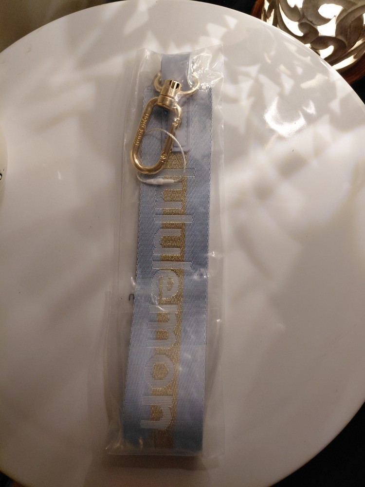 Lululemon- Never Lost Key Chain - Gold Tone Hardware