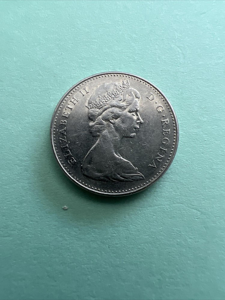 1965 Canada 5 Cents coin circulate.