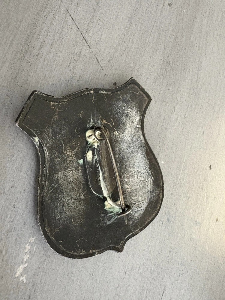 Pinkerton security badge