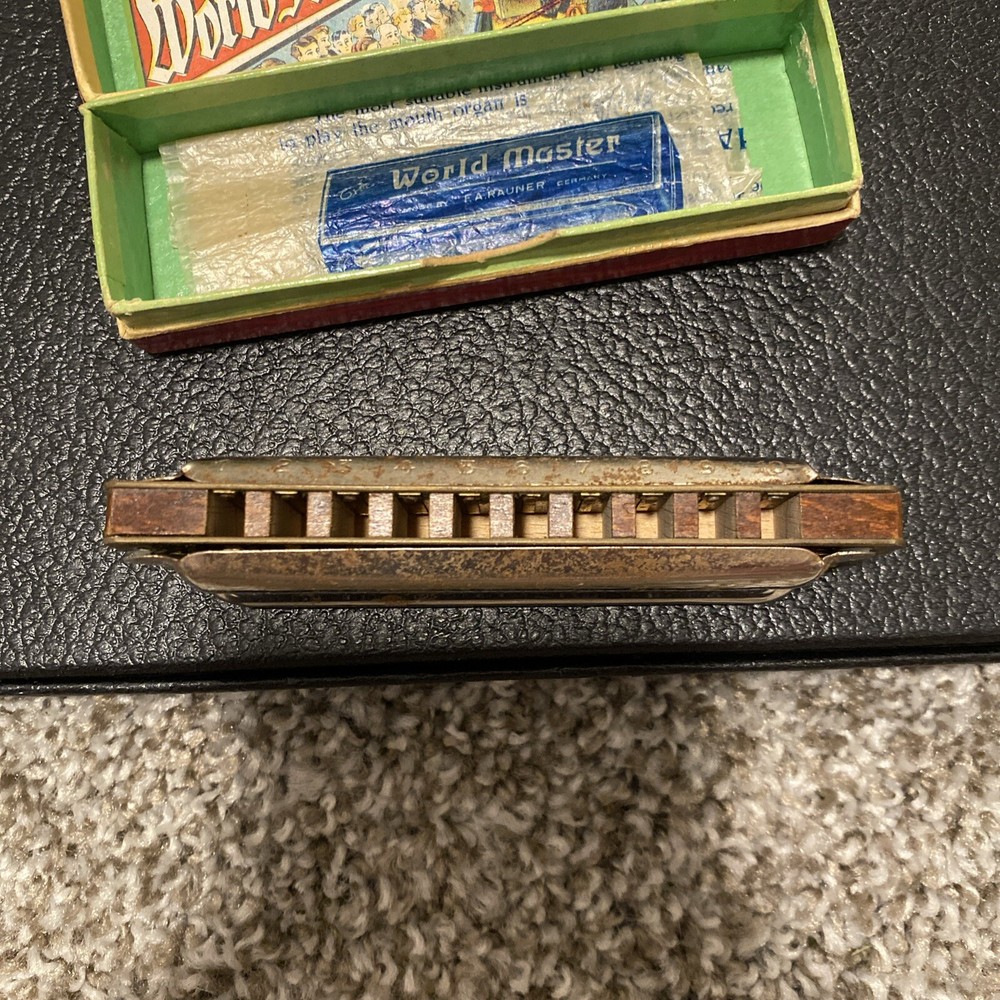 Vintage world master brass harmonica