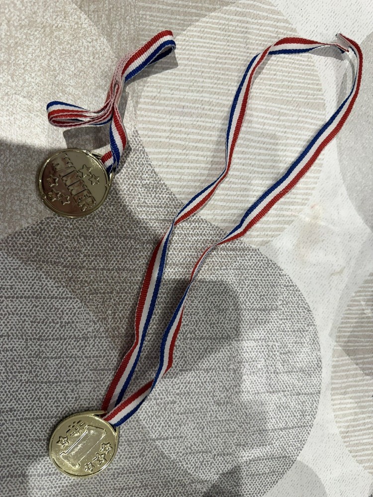 4 Plastic Toy Medals