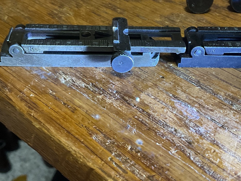 Remington 1903 sight base, leaf, slide, elevation, windage knobs marked R. 1 set