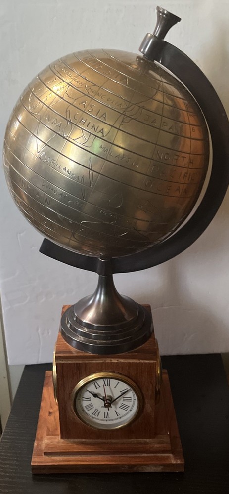 Bains Kushnick Clock Globe