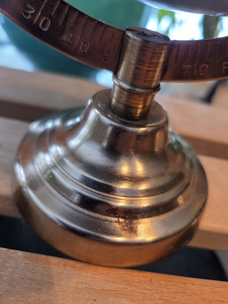 Threshold decorative globe on a copper stand