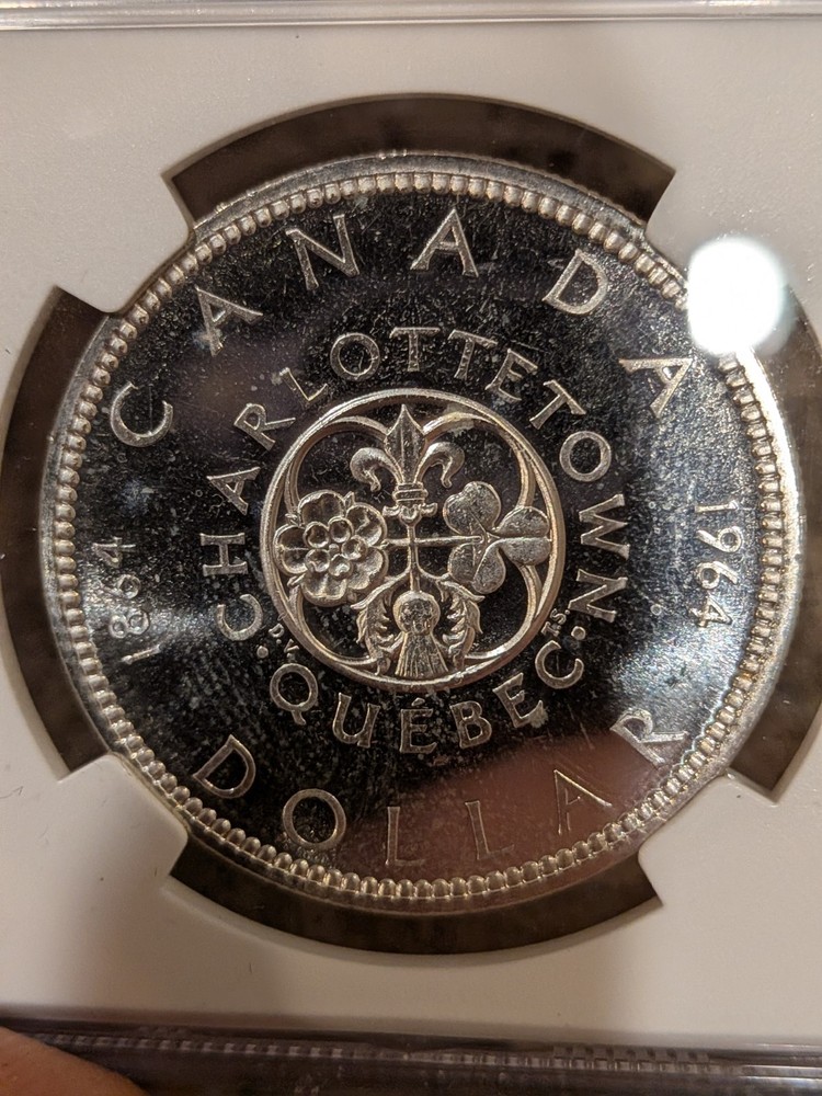 1964 CANADA SILVER $1 DOLLAR..NGC PL-65