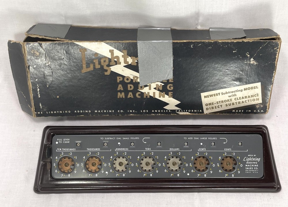 Vintage Lightning Adding Machine with Bakelite Stand and the box