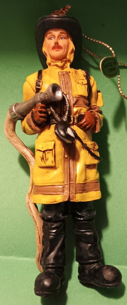 Firefighter w/ Nozzle Christmas Ornament