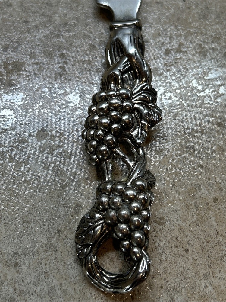 Silver Cheese Knife Grape Vine design