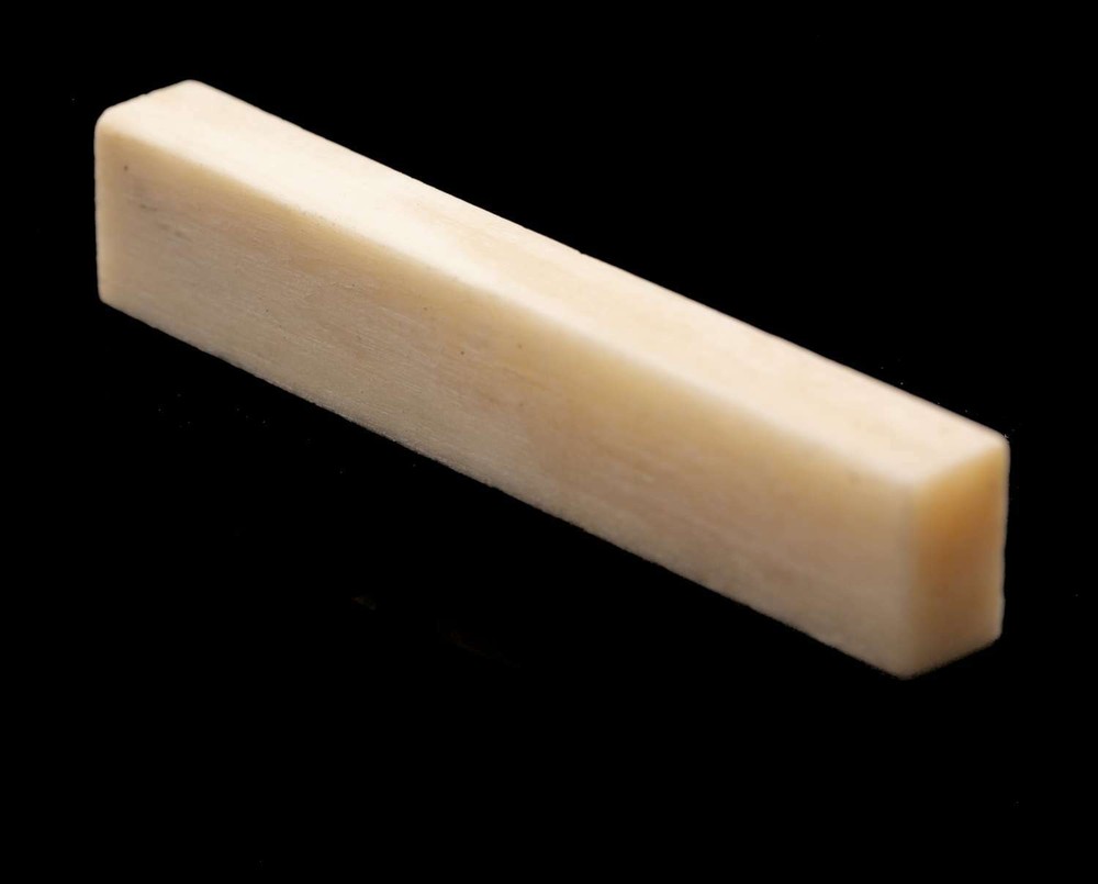Tone Ninja Genuine Bone Nut Blank, Unbleached 1/4" thick NUT-NU25