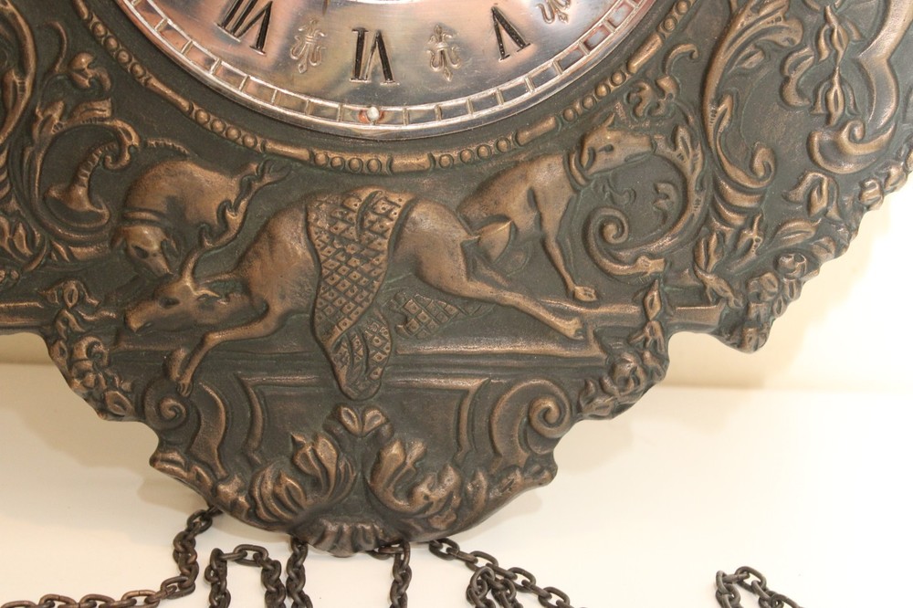 German Black Forest wall clock, Repousse Bronze Hunting Weights Pendulum