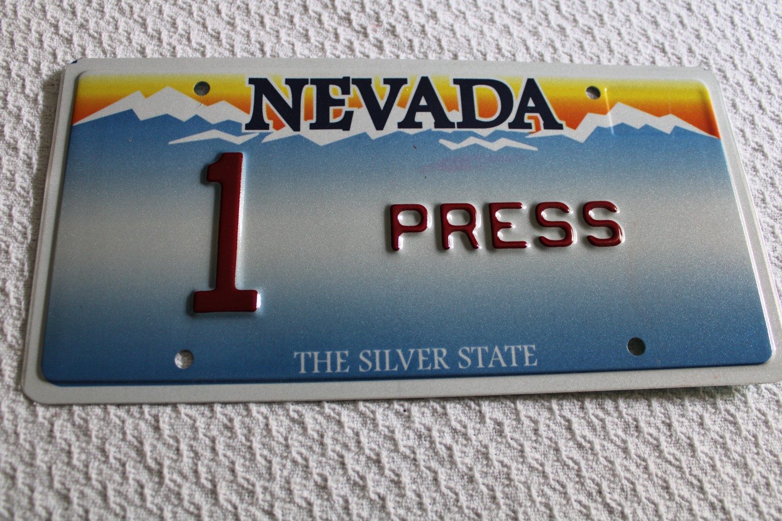COLLECTION OF (9) NEWS/MEDIA/TV/RADIO PRESS LICENSE PLATES FROM VARIOUS STATES
