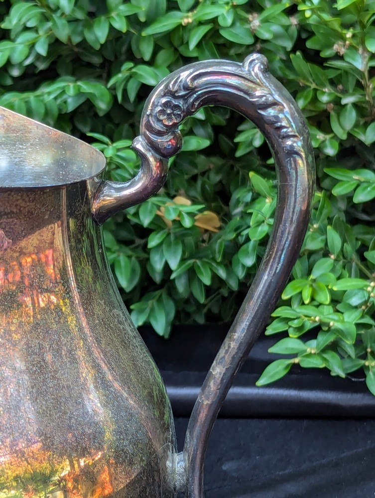 VINTAGE SILVER PLATED WATER PITCHER ICE GUARD NICE PATINA Ornate Legs Elegant