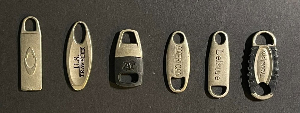 Lot of (6) Assorted Luggage Replacement Zipper Pulls.