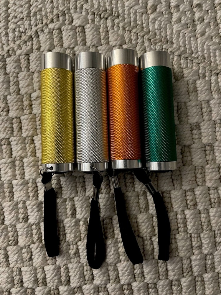 4 PCS Portable Flashlight - 4 Colors- Require 3 AAA Batteries Each(Not Included)
