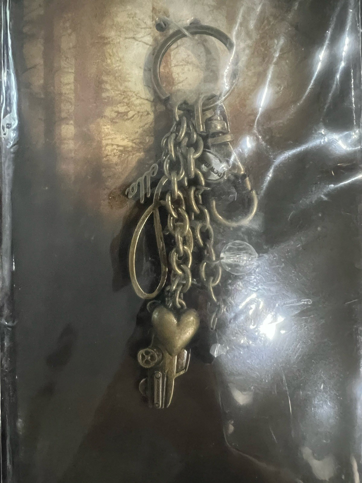 Highly Collectable The Twilight Saga New Moon Keyring BagClip E Tribe Tattoo